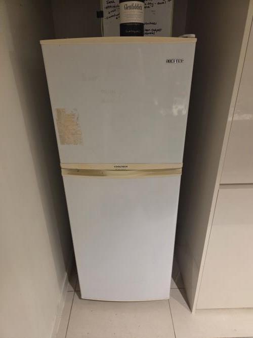 Second-hand Samsung 210L Top Mount Fridge with most shelves missing