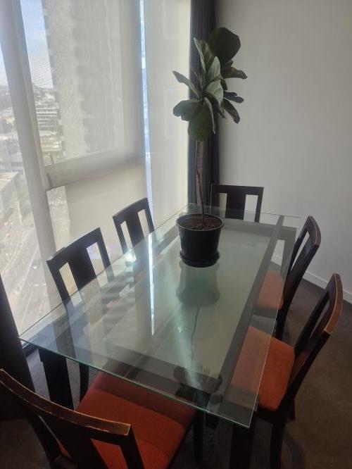 Second-hand Glass Dining Table with 6 Chairs