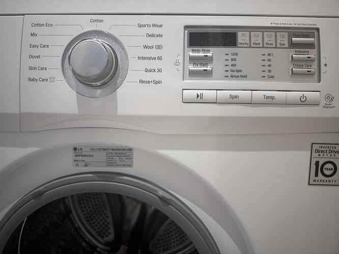 Second-hand LG 7kg Front Load Washing Machine - Photo 4)